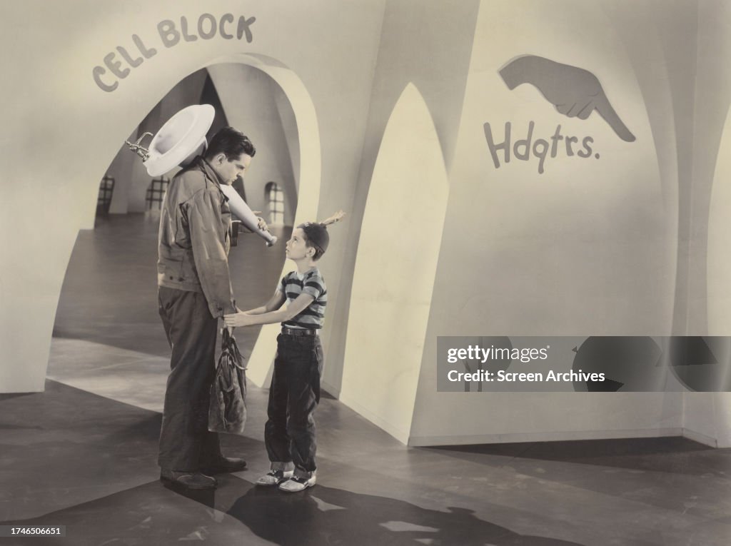 Tommy Rettig and Peter Lind Hayes in a scene from the 1953 fantasy ...