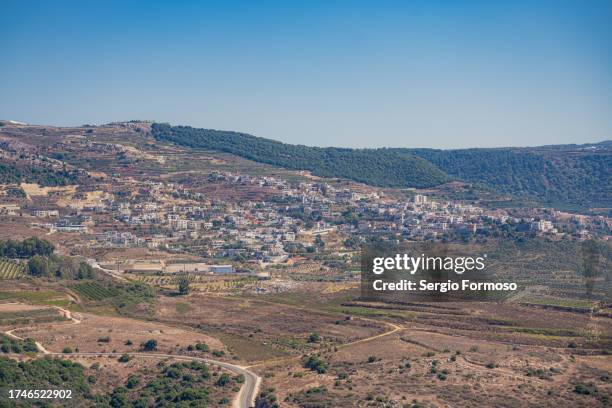ein qiniyye, druze village in the golan heights - golan heights stock pictures, royalty-free photos & images