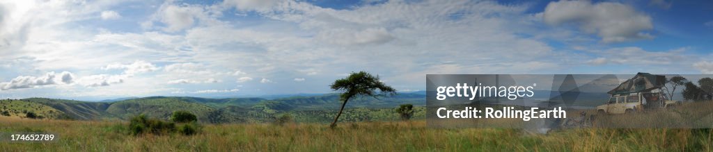 Man overlooking a savannah in Rwanda