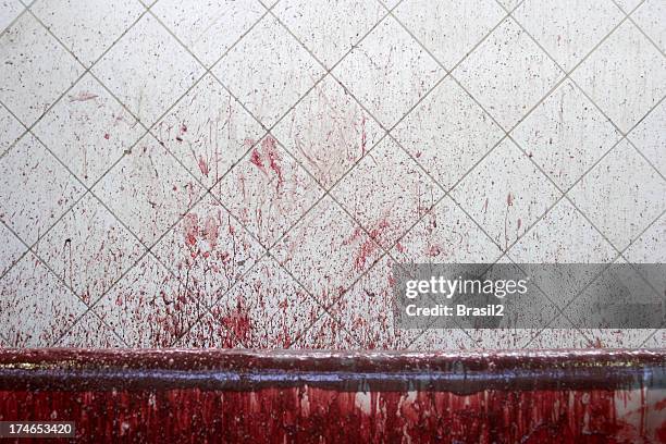 blood staining on white tiled wall - abattoir stock pictures, royalty-free photos & images