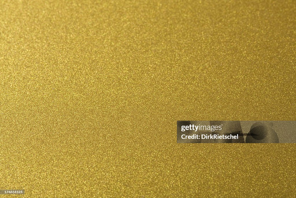 Nahaufnahme Schuss von abstrakten goldenen Hintergrund.