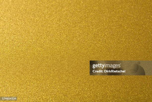 closeup shot of abstract golden background. - gold foil texture stockfoto's en -beelden