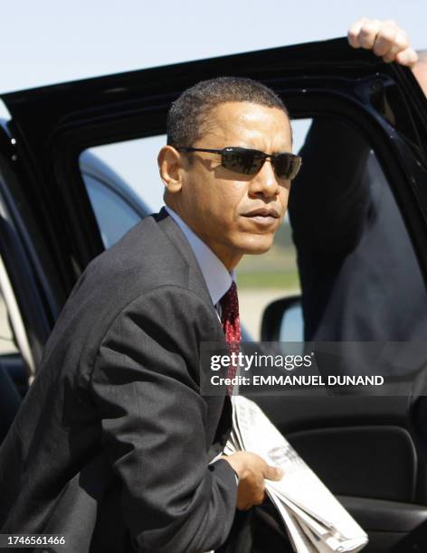 Democratic presidential candidate Illinois Senator Barack Obama prepares to board a plane at Dulles International Aiport in Chantilly, Virginia,...