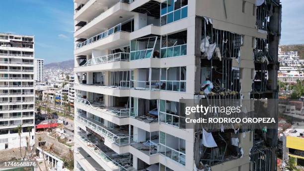 View of a building partially destroyed after the passage of Hurricane Otis in Acapulco, Guerrero State, Mexico, on October 26, 2023. Hurricane Otis...