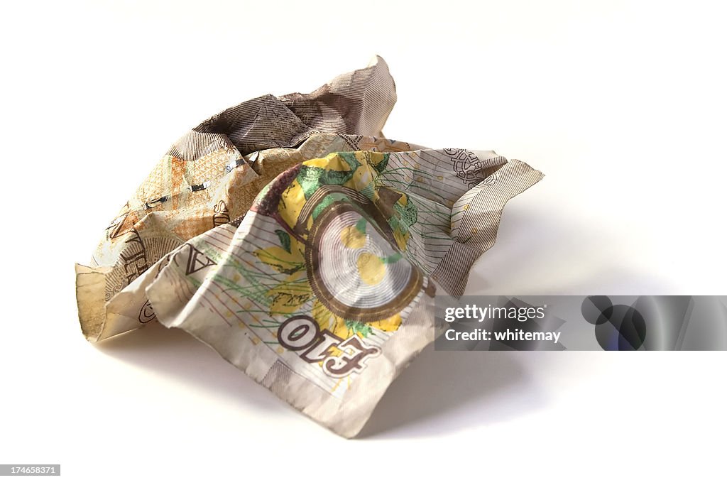 Close up of a crumpled up ten pound note