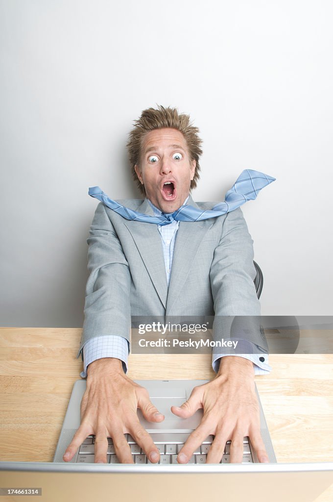 Shocked Businessman Office Worker Looking Surprised at His Laptop