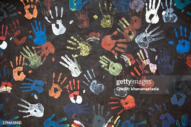 colorful handprints - hand print on wall stock pictures, royalty-free photos & images