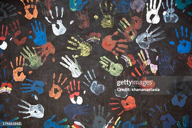 colorful handprints - children and art stock pictures, royalty-free photos & images