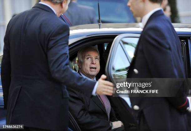 Republican presidential candidate Senator John McCain leaves the Elysee Palace after a meeting with France's President Nicolas Sarkozy on March 21,...