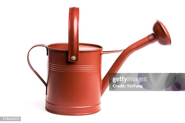 red metal watering can, old-fashioned gardening equipment isolated on white - watering can stock pictures, royalty-free photos & images