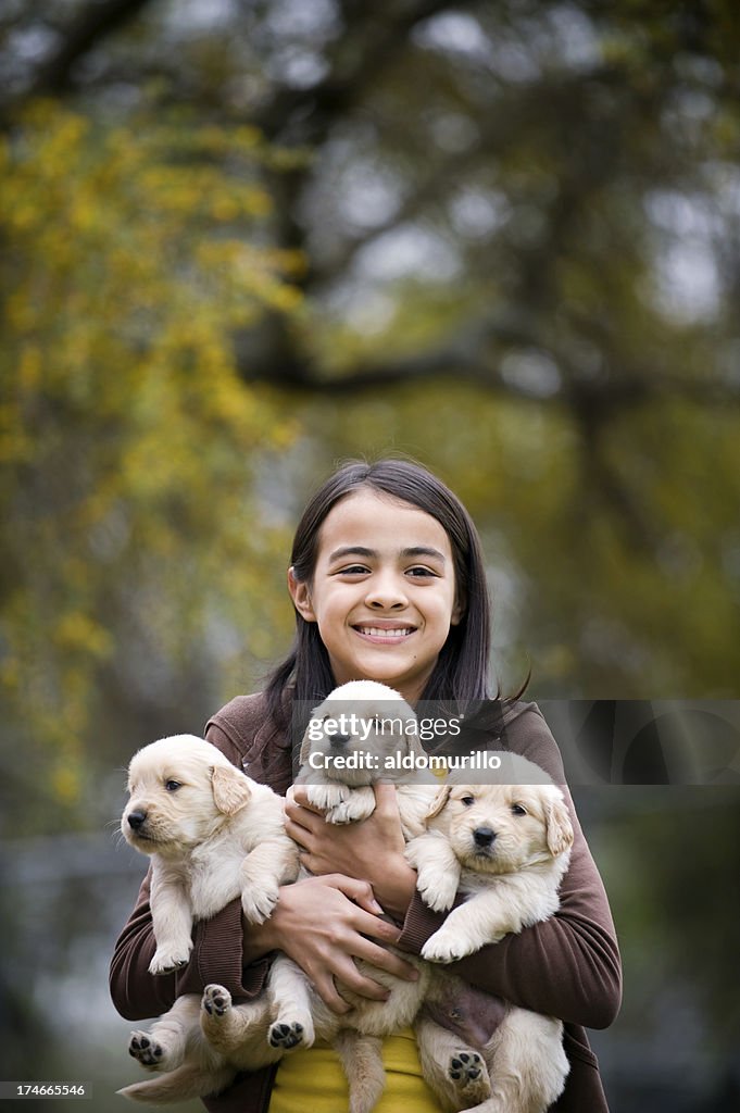 Cute girl whit her puppies