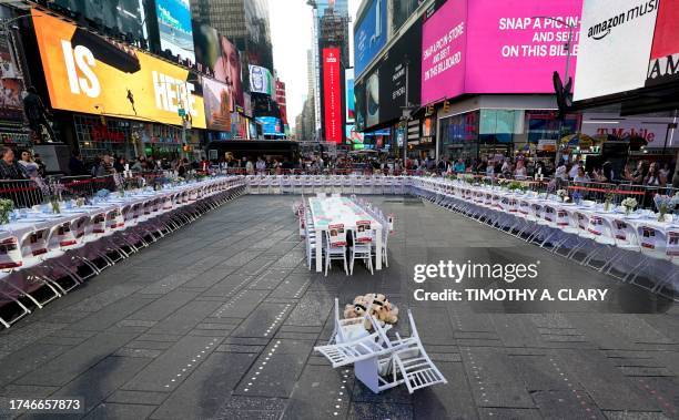 The Israeli-American Council, American Jewish Committee, and other Jewish groups unveil an installation in Times Square October 26, 2023 featuring a...