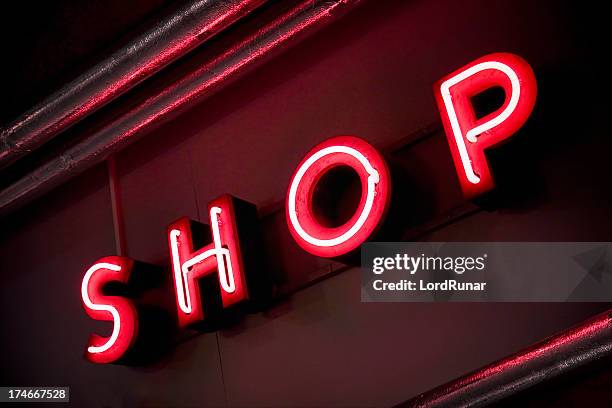 neon shop sign - store sign stockfoto's en -beelden