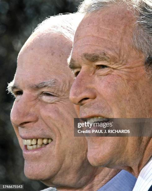 President George W. Bush , with Republican presidential candidate John McCain, speaks in the Rose Garden of the White House on March 5, 2008 in...