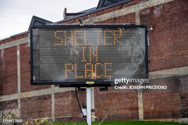 Sign calls for people to shelter in place in Lewiston, Maine on October 26, 2023 the day after a mass shooting. Hundreds of police in the US state of...