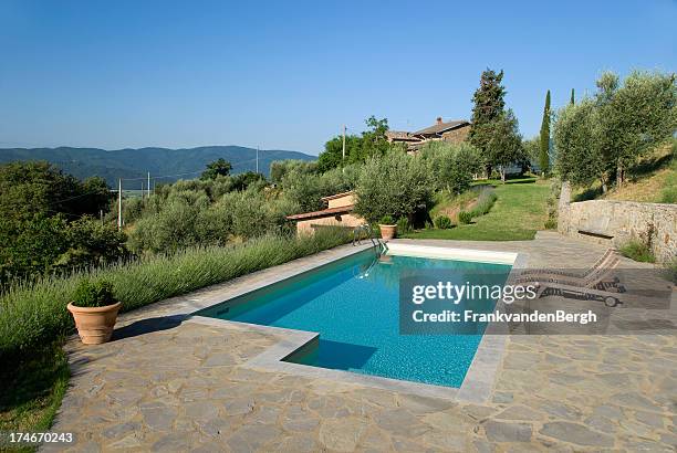 holiday home with swimming pool in tuscany - swimming pool hill stock pictures, royalty-free photos & images
