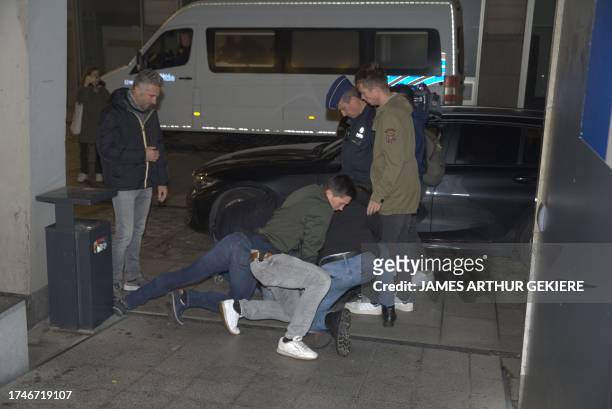 Attackers of Dutch politician Thierry Baudet pictured during a lecture by Dutch politician Baudet organized by the Gent chapter of conservative...