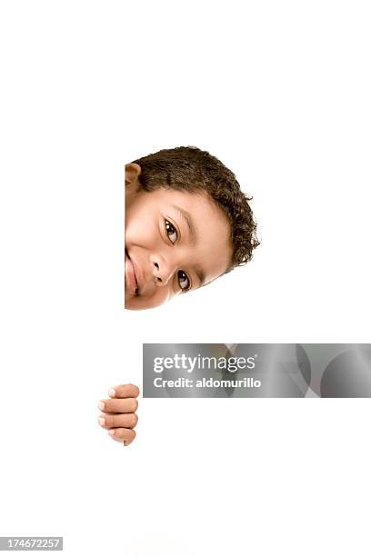 little boy peeking - gluren stockfoto's en -beelden