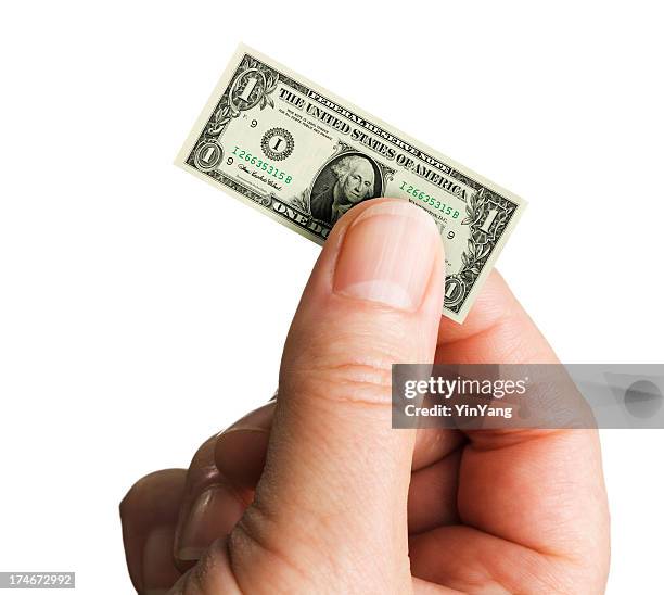 small shrinking currency dollar in inflation on white background - diminutive stock pictures, royalty-free photos & images