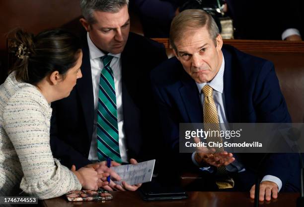 Rep. Jim Jordan , Republican Speaker designee, talks to his Chief of Staff Kevin Eichinger and Rep. Elise Stefanik after the House of Representatives...