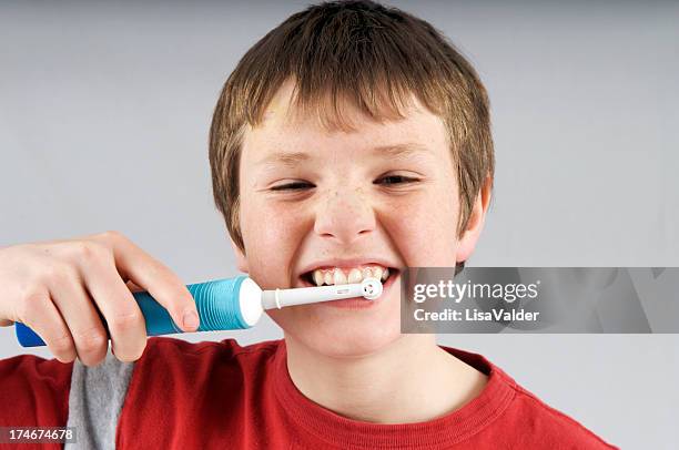 brushing teeth - dental calculus stock pictures, royalty-free photos & images