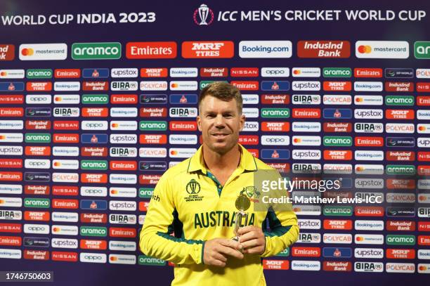 David Warner of Australia poses after being named Player of the Match following the ICC Men's Cricket World Cup India 2023 between Australia and...