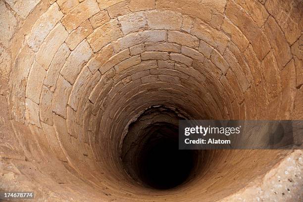 well at castle qasr amra - brick wall hole stock pictures, royalty-free photos & images