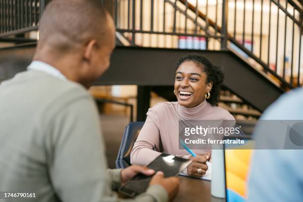 university students during round-table discussion - round table stock pictures, royalty-free photos & images