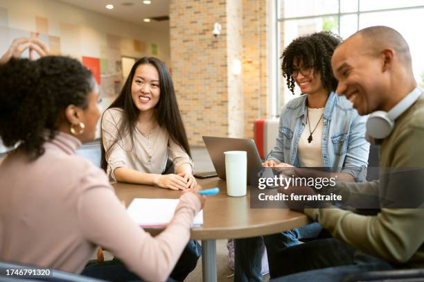 university students during round-table discussion - round table discussion stock pictures, royalty-free photos & images