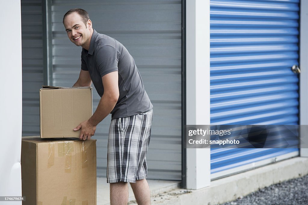 Man with Boxes Outside Self Storage Unit Lifestyle