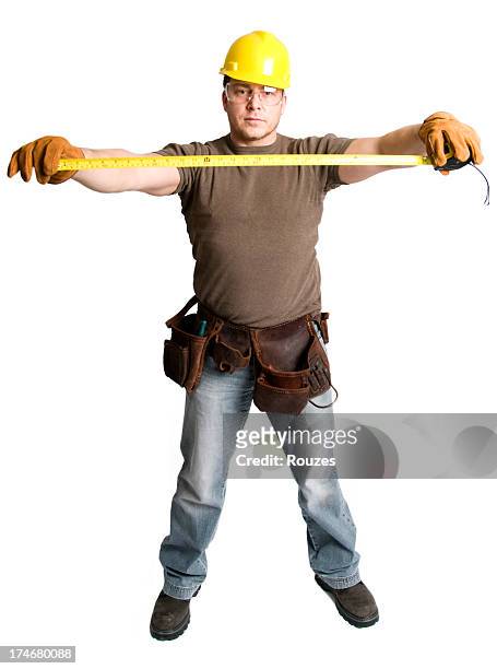 builder measuring - builder standing isolated stock pictures, royalty-free photos & images