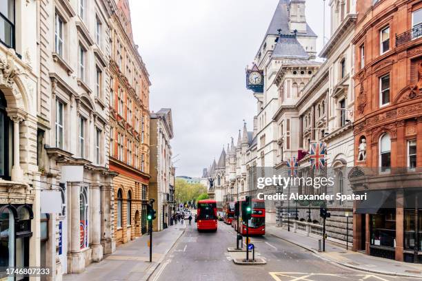 fleet street with red double-decker buses, london, england, uk - covent garden stock pictures, royalty-free photos & images