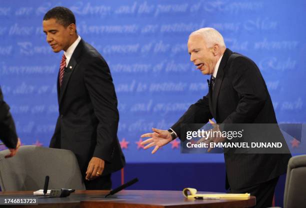 Republican presidential candidate John McCain and Democrat Barack Obama leave the table after the final presidential debate at Hofstra University in...
