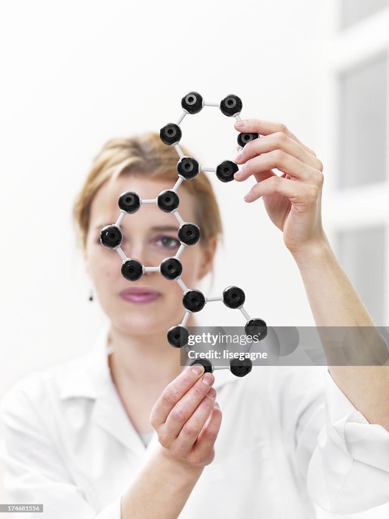 Researcher looking at a molecular structure