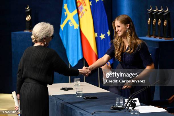 Meryl Streep, winner of the Princess of Asturias Award for the Arts, shakes hands with Crown Princess Leonor of Spain at the "Princesa De Asturias"...