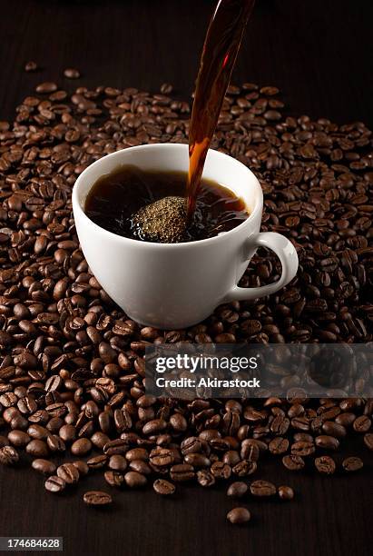 pouring fresh coffee - black coffee stock pictures, royalty-free photos & images