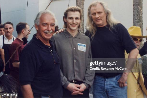 Austin McCann, Sergei Fedorov of the Detroit Red Wings and Joe Pytka pose for a photo on the set of the Nike "Super Bowl Party" commercial in January...