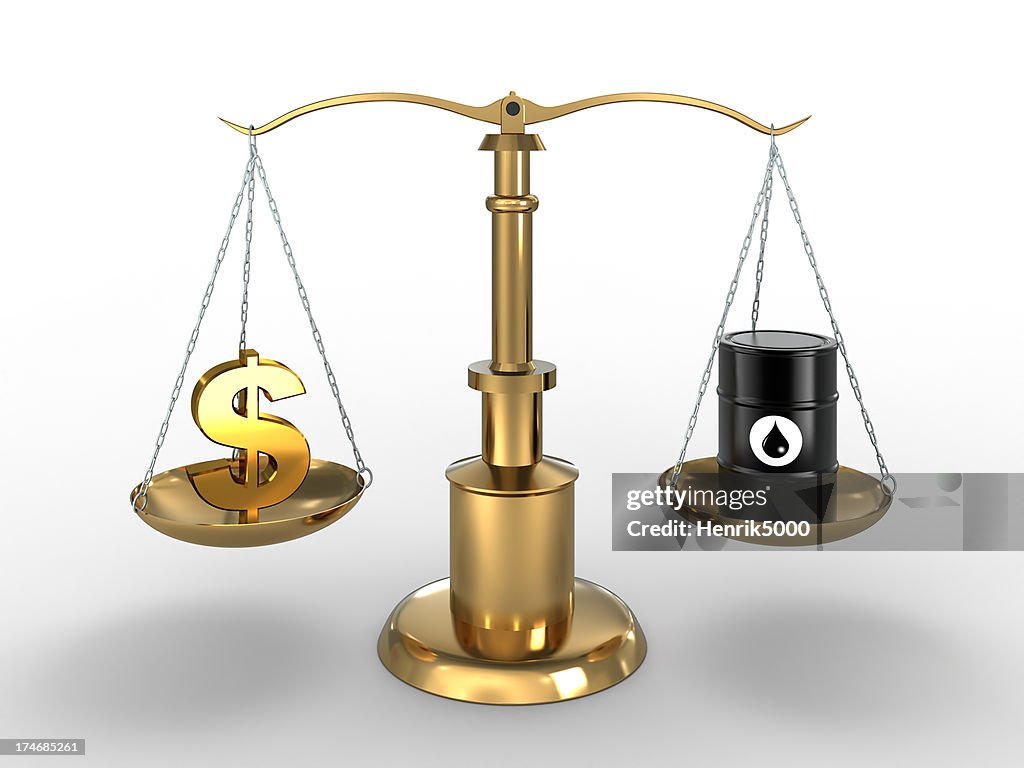 Dollar sign and Oil Barrel in balance (Clipping path included)