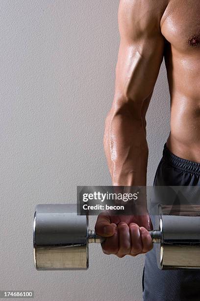 man lifting dumbell - vein muscle stock pictures, royalty-free photos & images