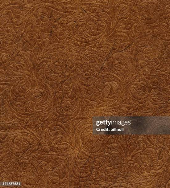 scroll eingraviertem vintage-leder - brokat stock-fotos und bilder