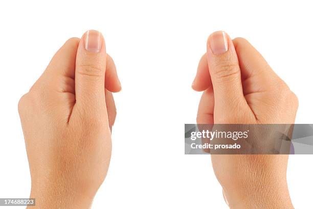 two hands - fingernail stockfoto's en -beelden