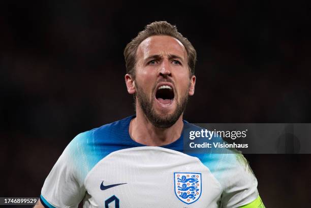 Harry Kane of England celebrates scoring his second goal during the UEFA EURO 2024 European qualifier match between England and Italy at Wembley...