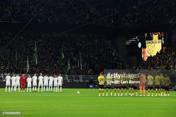 Players, match officials and fans observe a minute's silence in memory of two Swedish supporters, victims of yesterday’s terrorist attack in Brussels...