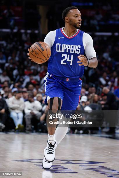 Los Angeles, CA, Wednesday, October 25, 2023 - LA Clippers guard Norman Powell brings the ball up court during second half action against the...