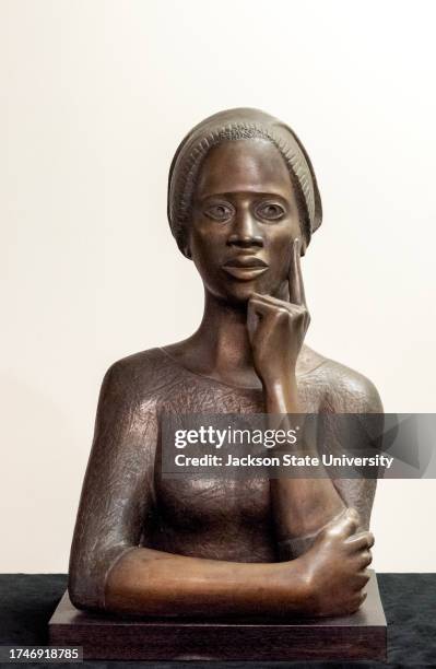 Front view of a waist-length bronze bust of Phillis Wheatley a mid -18th century poet, Created by Elizabeth Catlet. The bust was originally...