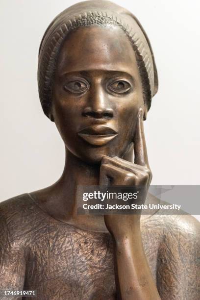 Front view of a waist-length bronze bust of Phillis Wheatley a mid -18th century poet, Created by Elizabeth Catlet. The bust was originally...