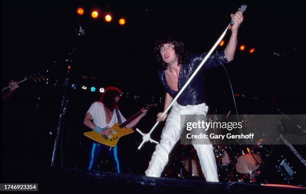 English Rock singer Joe Elliott, of the group Def Leppard, performs onstage at Nassau Coliseum , Uniondale, New York, August 14, 1981. Visible in the...