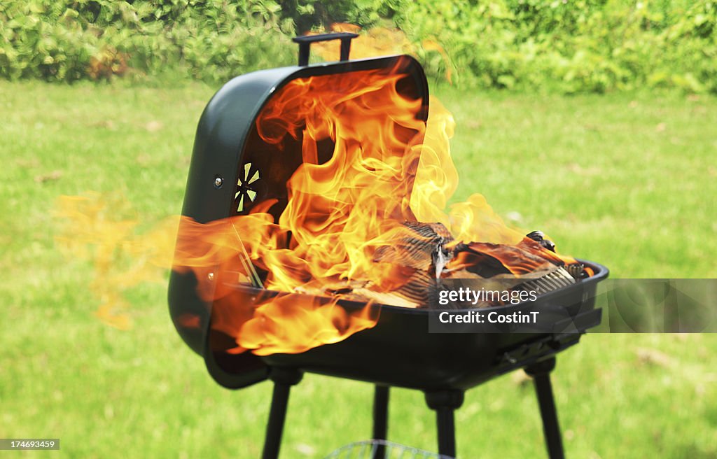Barbecue outdoors with large flames