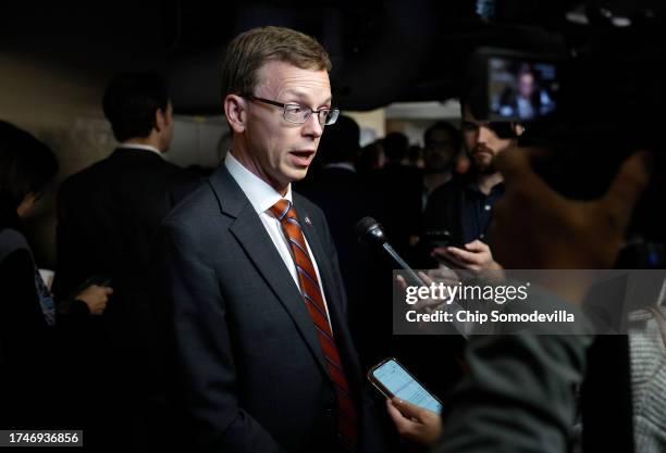 Rep. Dusty Johnson speaks to the media as he leaves a closed-door House Republican meeting at the U.S. Capitol on October 20, 2023 in Washington, DC....