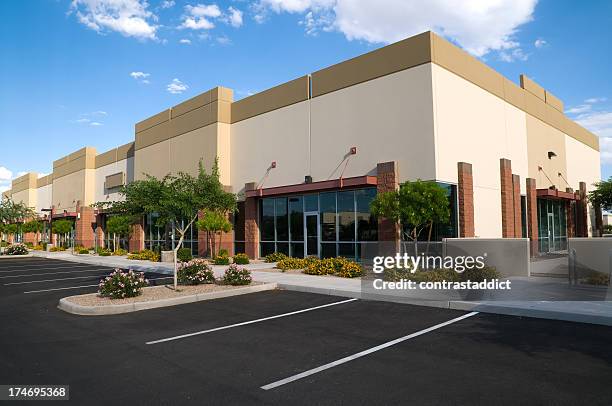 bright colored photo of parking lot and office building - konsumerism bildbanksfoton och bilder